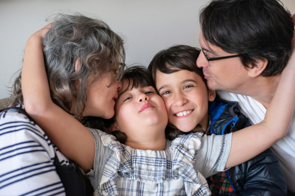 Happy family celebrating their investment success together